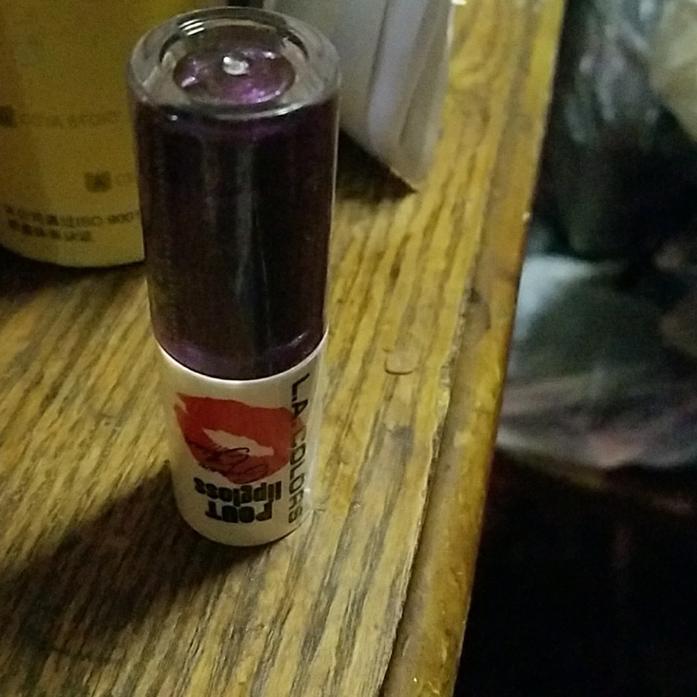 La color lip gloss new not opened shiny purple col